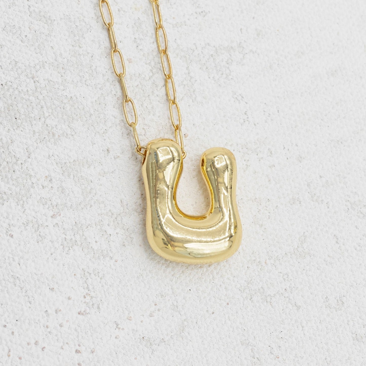 Gold bubble necklace with letters