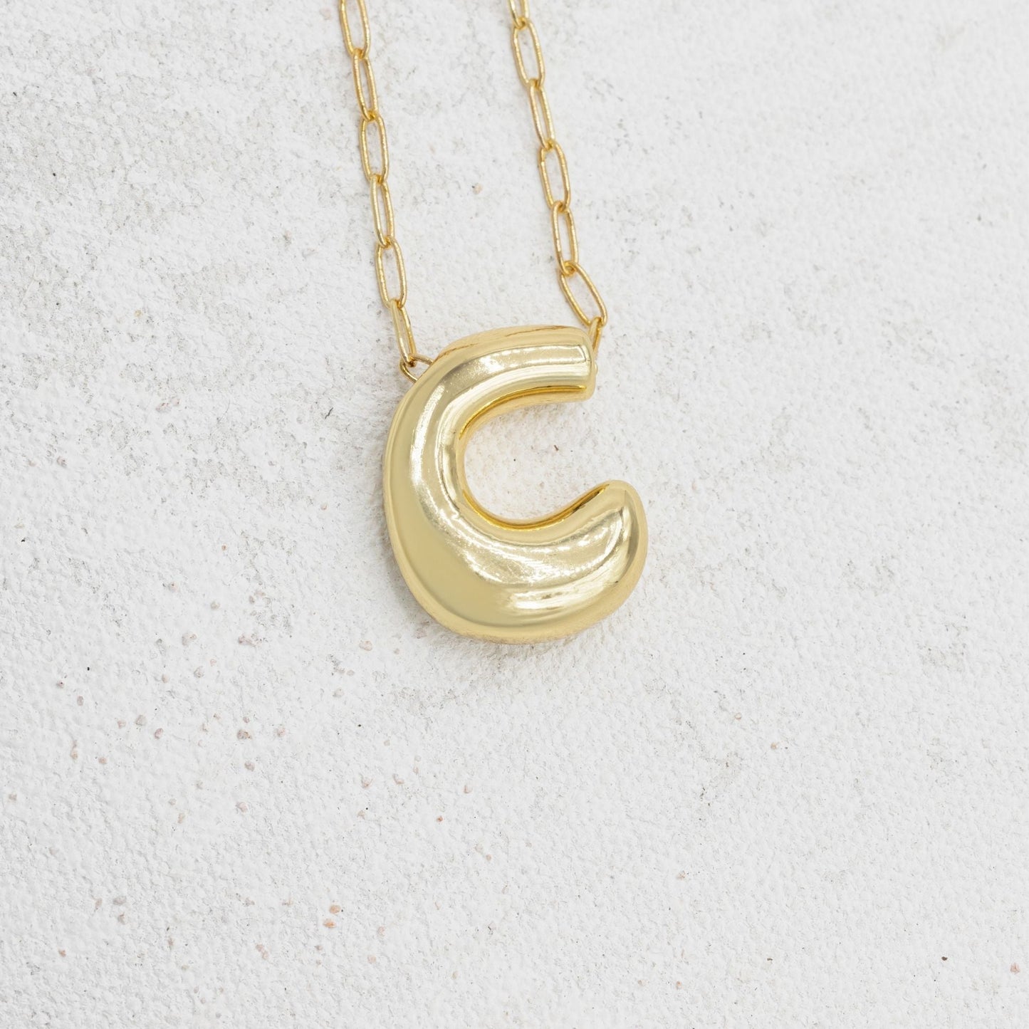 Gold bubble necklace with letters