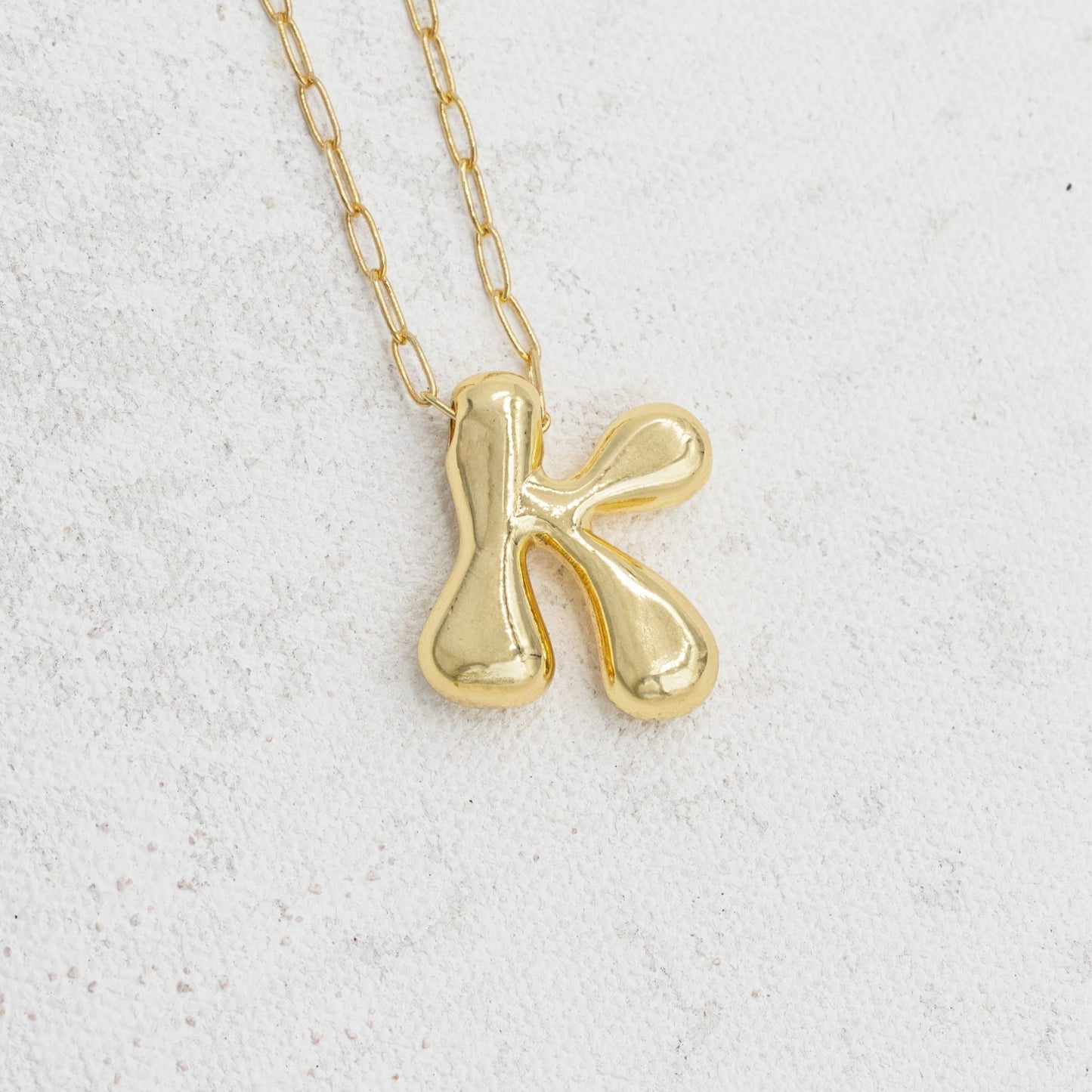 Gold bubble necklace with letters