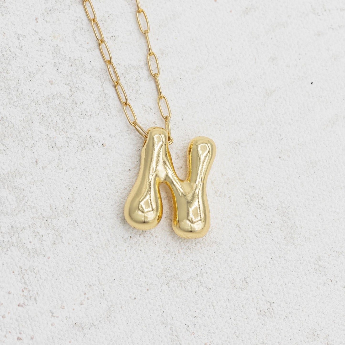 Gold bubble necklace with letters