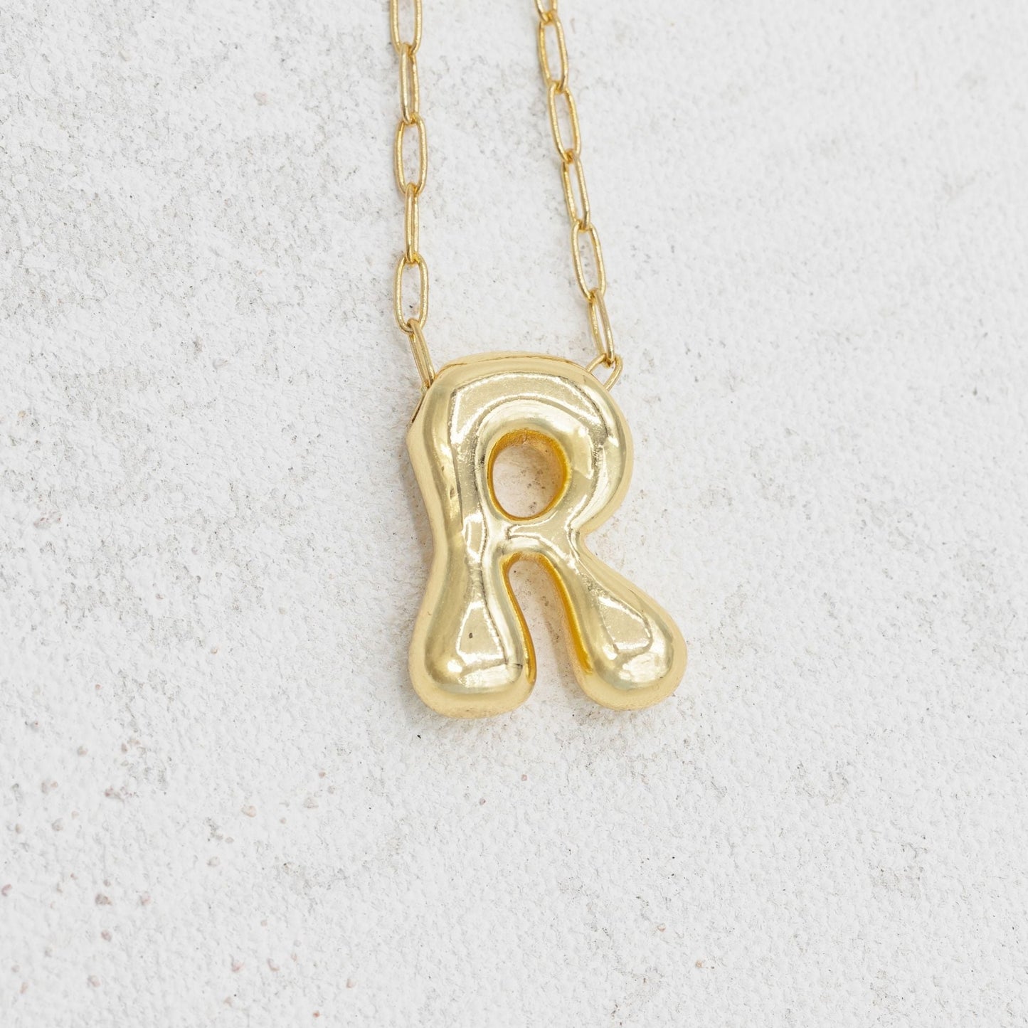 Gold bubble necklace with letters