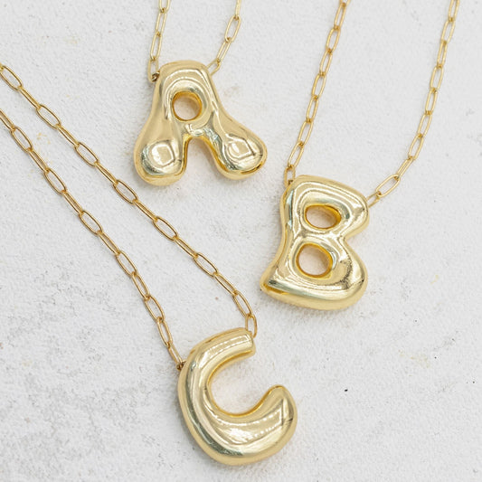 Gold bubble necklace with letters