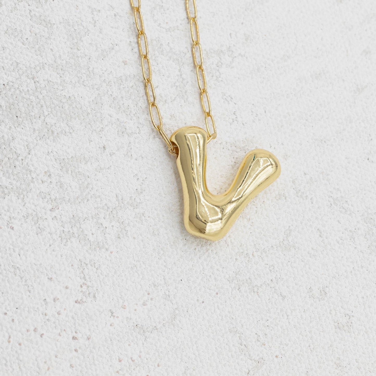 Gold bubble necklace with letters