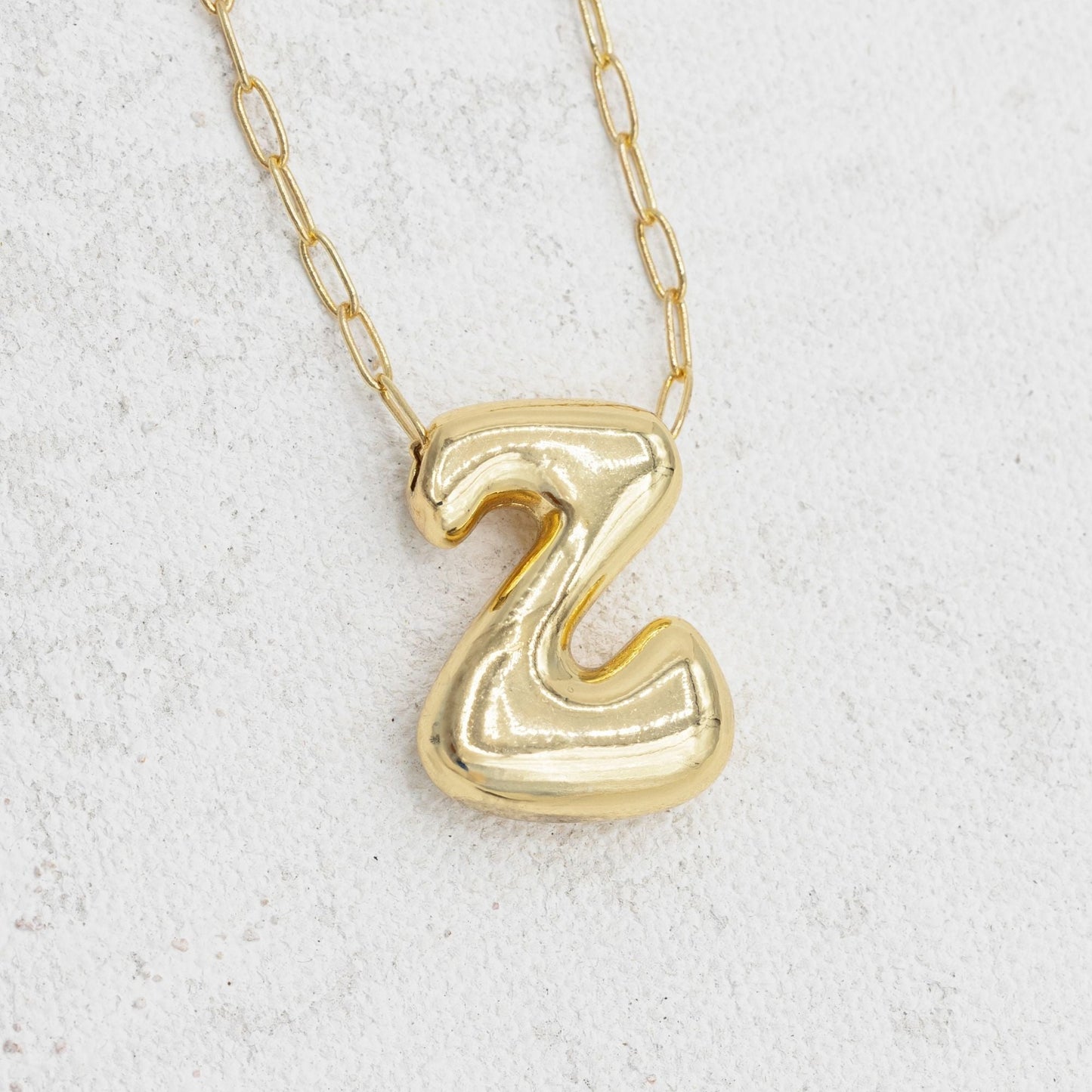 Gold bubble necklace with letters