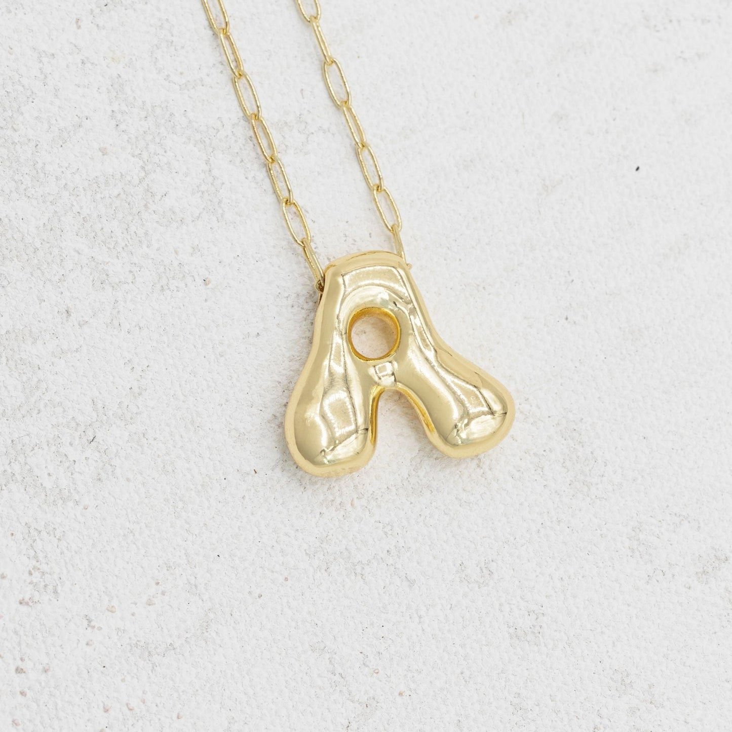 Gold bubble necklace with letters