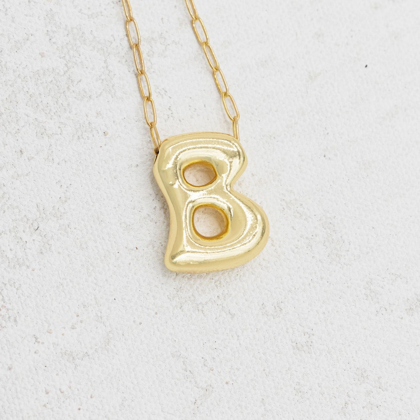 Gold bubble necklace with letters