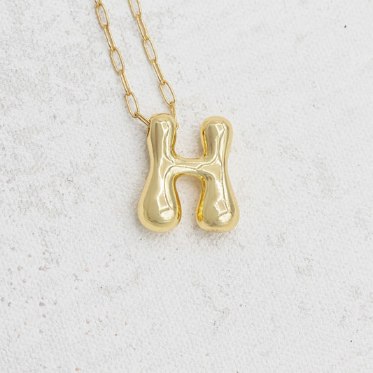 Gold bubble necklace with letters